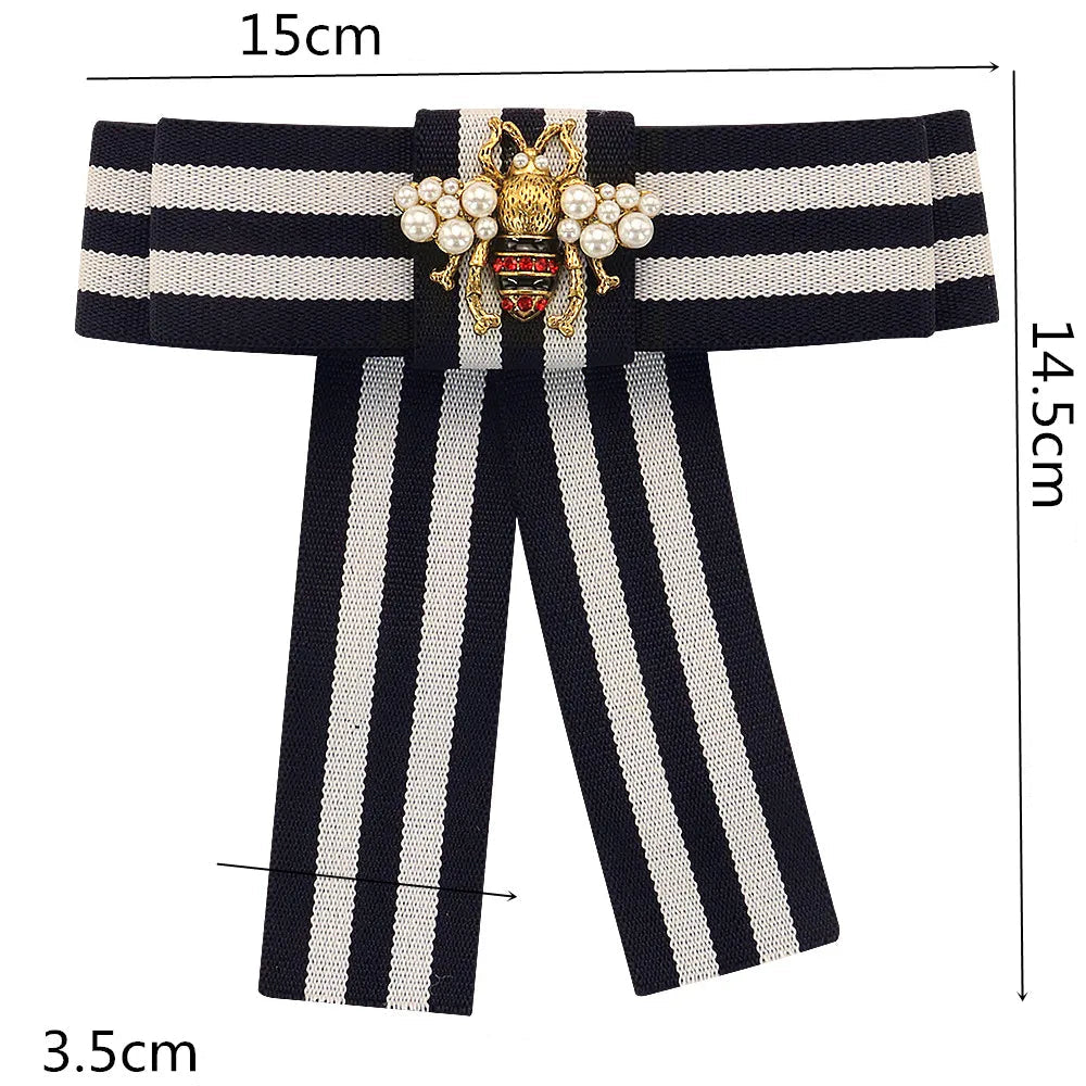 https://ae01.alicdn.com/kf/S74634e5a511e4c70a6eaab50f54b13deZ/Bow-Brooch-For-Women-Fabric-Strip-Elegant-bee-Occupation-Shirt-Collar-Tie-Embroidery-Bee-Brooches-Pin.jpg