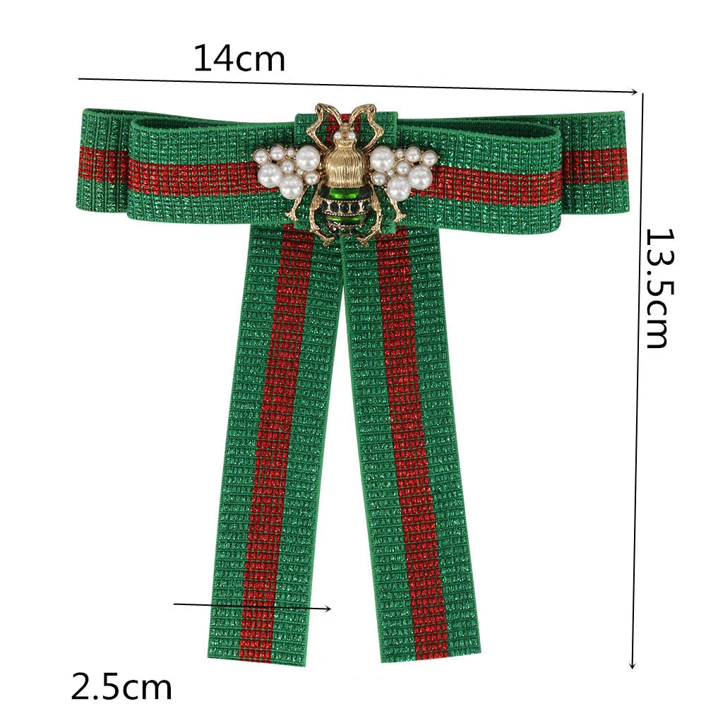 https://ae01.alicdn.com/kf/Sd374cf56fc76449e9f3957f22f54f03b3/Bow-Brooch-For-Women-Fabric-Strip-Elegant-bee-Occupation-Shirt-Collar-Tie-Embroidery-Bee-Brooches-Pin.jpg
