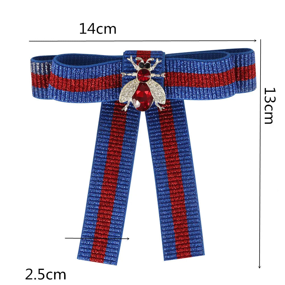 https://ae01.alicdn.com/kf/Sa4e6a5097d824d6c91fd03a86e86b71ay/Bow-Brooch-For-Women-Fabric-Strip-Elegant-bee-Occupation-Shirt-Collar-Tie-Embroidery-Bee-Brooches-Pin.jpg
