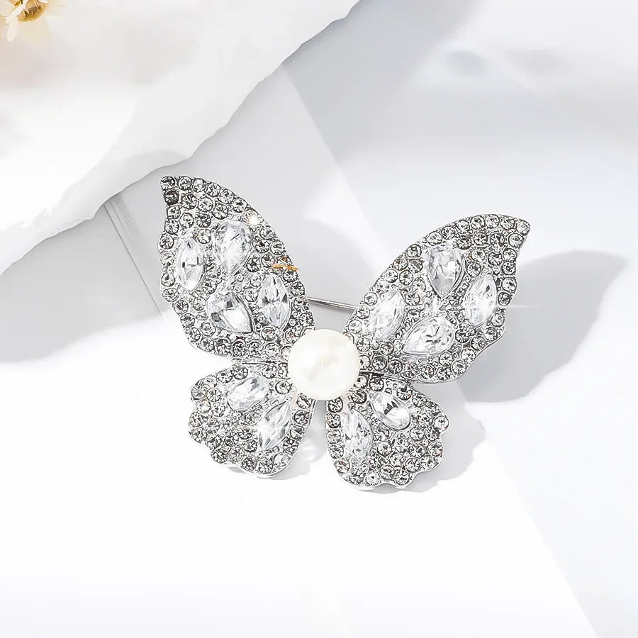 https://ae-pic-a1.aliexpress-media.com/kf/S1ccc10fe4afe4647997a79baf254b41fS/Luxury-Butterfly-Rhinestone-Brooches-for-Women-Fashion-Pin-Brooch-Clothes-Accessories-Insect-Metal-Pins-Jewelry-Wedding.jpg