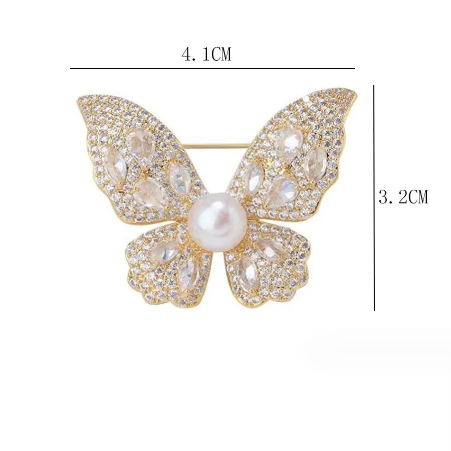 https://ae-pic-a1.aliexpress-media.com/kf/S7088223dbe5640a391f8642ac5fd16b90/Luxury-Butterfly-Rhinestone-Brooches-for-Women-Fashion-Pin-Brooch-Clothes-Accessories-Insect-Metal-Pins-Jewelry-Wedding.jpg