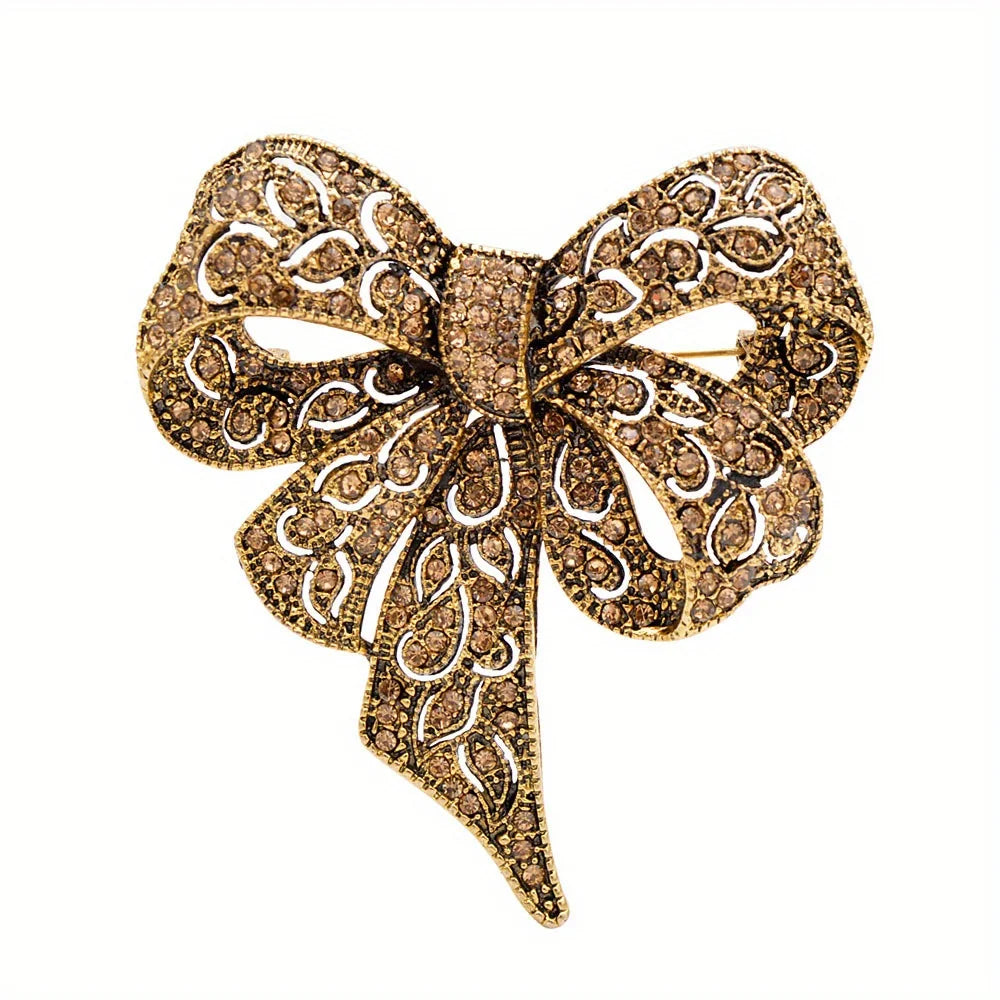https://ae-pic-a1.aliexpress-media.com/kf/S8cb59d7c83084f27bdb8f6d4171162b3t/Luxury-Crystal-Bow-Ribbon-Brooches-For-Women-Men-Fashion-Bowknot-Pins-Jewelry.jpg