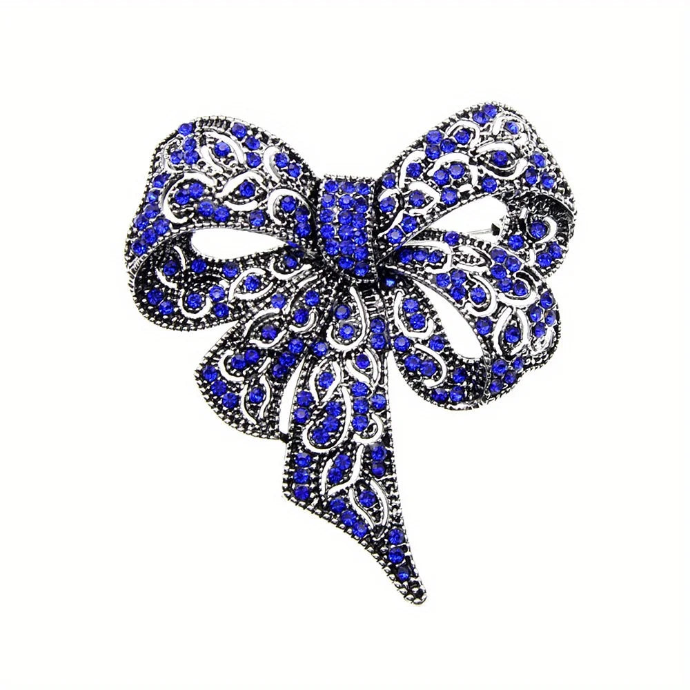https://ae-pic-a1.aliexpress-media.com/kf/S94dedd71f5d044c1a2d9db8970ce3710e/Luxury-Crystal-Bow-Ribbon-Brooches-For-Women-Men-Fashion-Bowknot-Pins-Jewelry.jpg