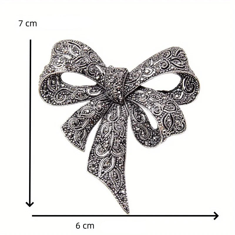 https://ae-pic-a1.aliexpress-media.com/kf/S9fb07bf809fa4f79a6d7ee265ee7b798z/Luxury-Crystal-Bow-Ribbon-Brooches-For-Women-Men-Fashion-Bowknot-Pins-Jewelry.jpg