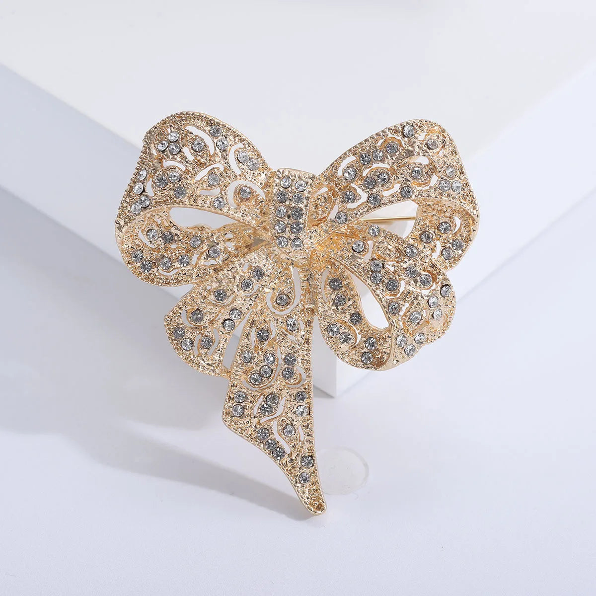 https://ae-pic-a1.aliexpress-media.com/kf/Sb6d03527fd87438d85616c0a433fb1a66/Luxury-Crystal-Bow-Ribbon-Brooches-For-Women-Men-Fashion-Bowknot-Pins-Jewelry.jpg