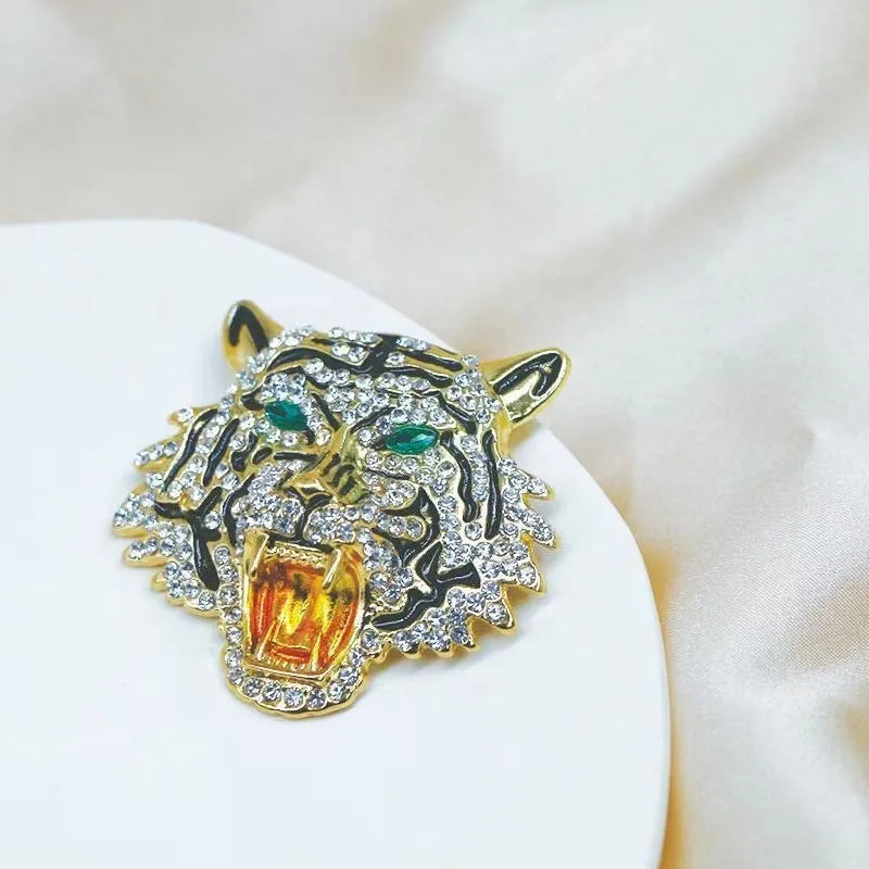 https://ae01.alicdn.com/kf/S62169fa6f59d4b9198445250fa2b3cf0P/Rhinestone-Roaring-Tiger-Brooches-Women-Men-Big-Tiger-Head-Party-Casual-Brooch-Pins-Gifts.jpg