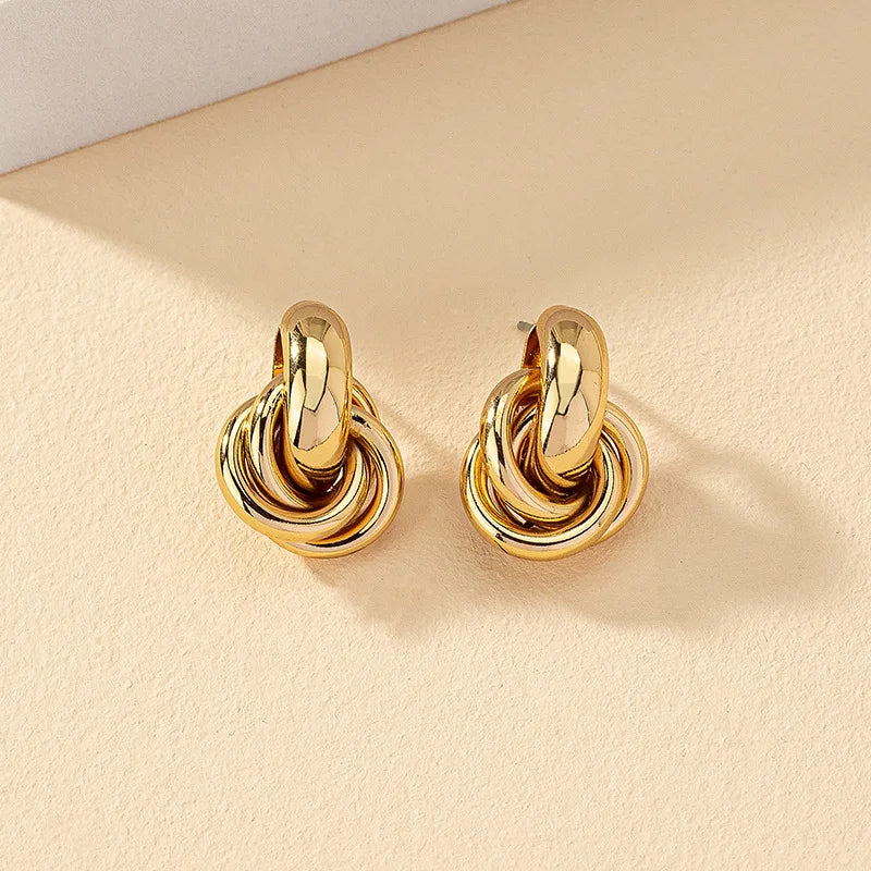 Brinco de argola com nó dourado e prateado para mulheres, chapeamento brilhante, brinco moderno, joias fofas para uso diário