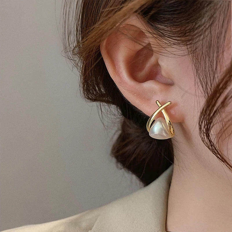 Design sensorial geometria cruz triângulo pérola caindo brincos novos brincos bonitos para meninas bonitos moda jóias acessório 2025