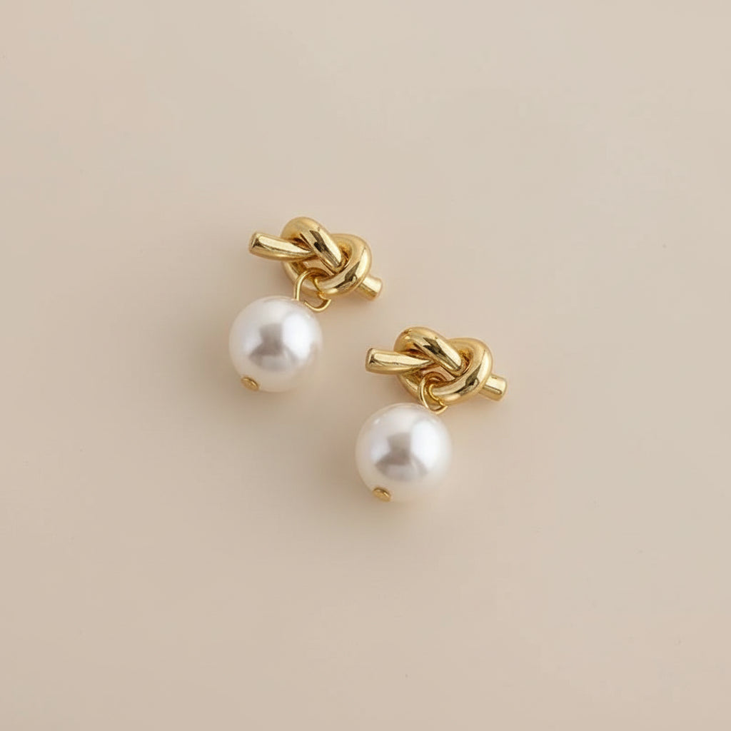 2025 design nó metal pérola pingente moda balançar brincos para feminino clássico novo criativo jóias cooper liga acessórios