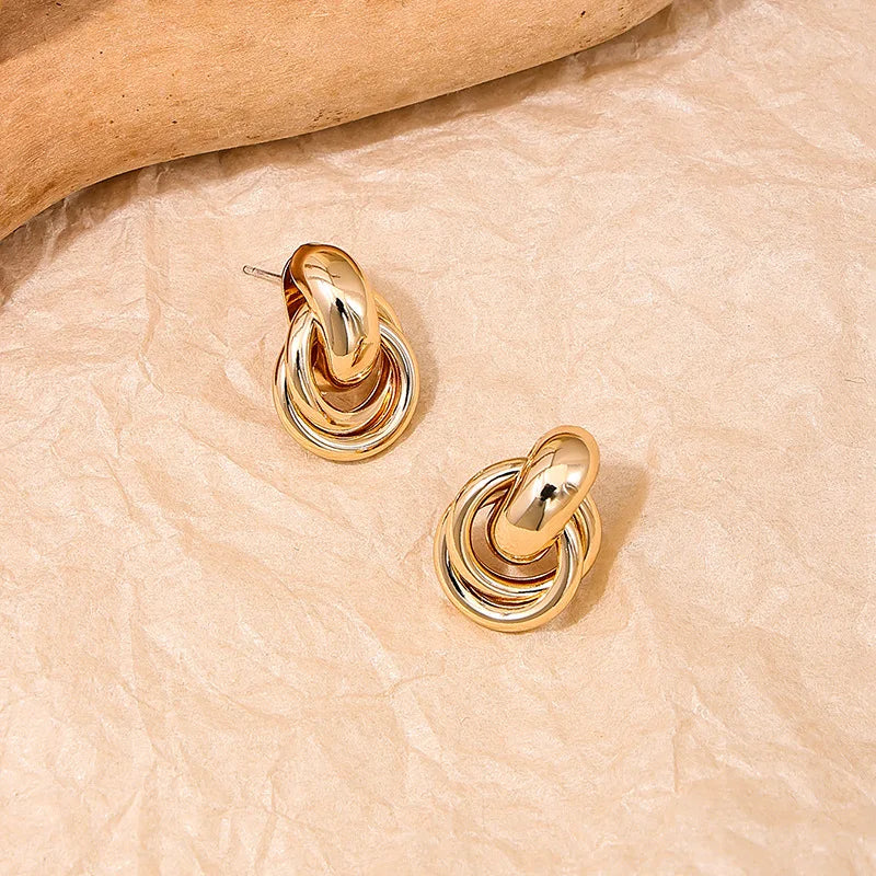 Brinco de argola com nó dourado e prateado para mulheres, chapeamento brilhante, brinco moderno, joias fofas para uso diário
