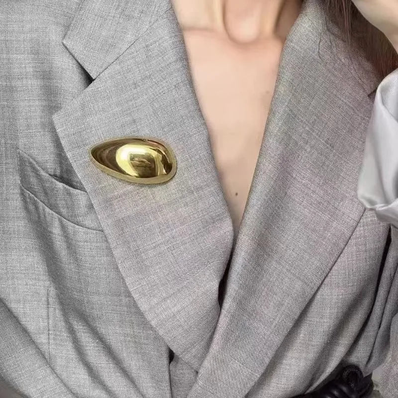 Broches de ovo de aço inoxidável Wuli & baby para mulheres unissex 2 cores lindas broches geométricos para festa e escritório presentes