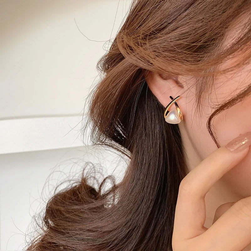 Design sensorial geometria cruz triângulo pérola caindo brincos novos brincos bonitos para meninas bonitos moda jóias acessório 2025