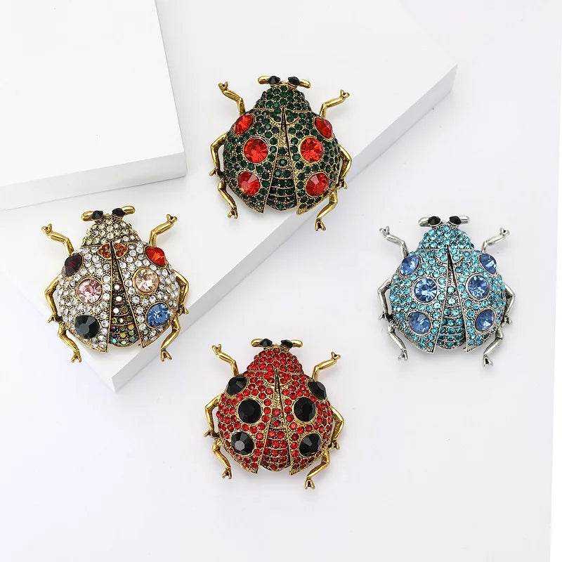 Wuli & baby luxo strass besouro broches para mulheres unissex 4 cores brilhante joaninha insetos festa casual broche pinos presentes